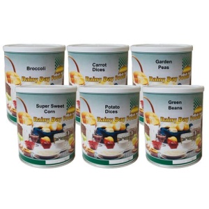 Six cans of baking powder on a white background.