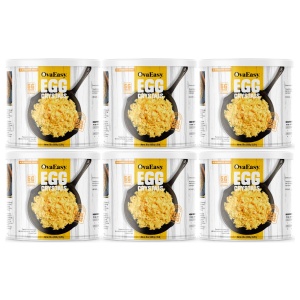 Six cans of OvaEasy eggs on a white background.