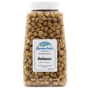 A plastic container of Harmony House Garbanzo Beans.