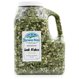 A jug of dried leeks on a white background.