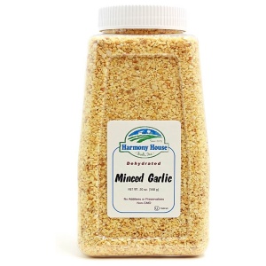 A jar of gourmet cornmeal on a white background.