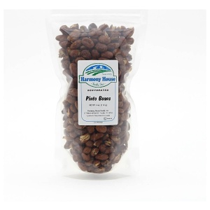 A bag of pecan nuts on a white background.