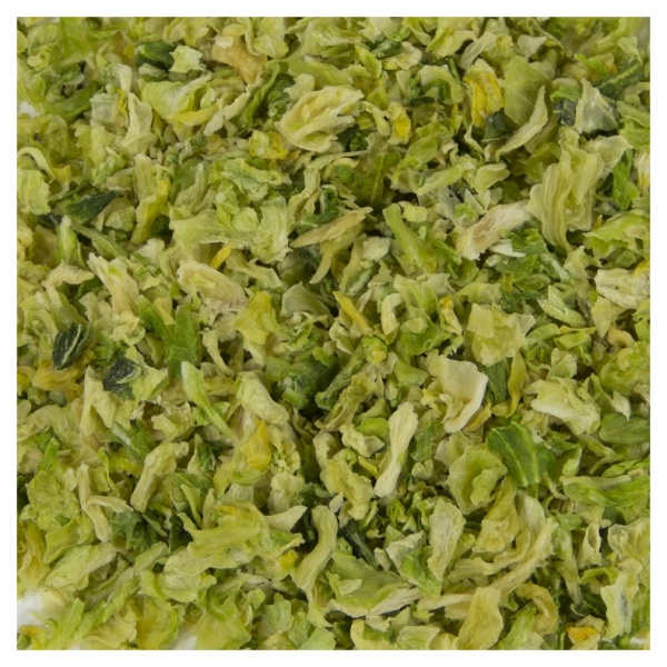 Shredded brussels sprouts on a white surface with Harmony House Dried Cabbage.