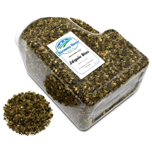 A container with a bag of dried herbs (28 oz) next to it.