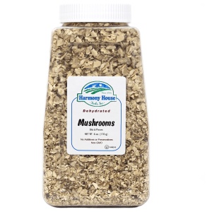 A jar of Harmony House Dried Mushrooms on a white background.