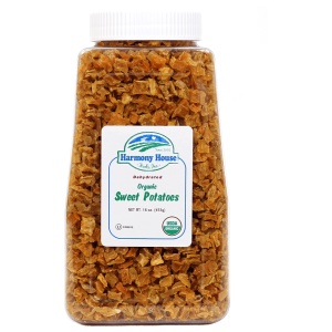 A jar of Harmony House Organic Dried Sweet Potatoes on a white background.