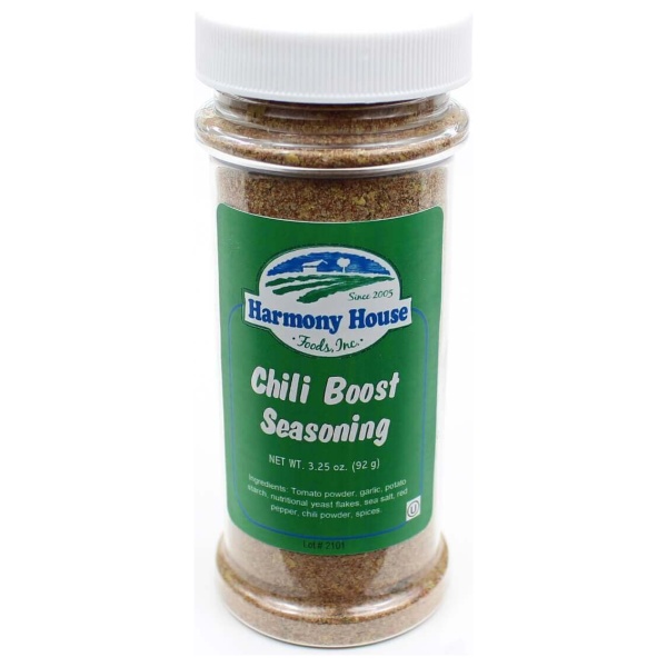 A jar of emergency food storage chili boost seasoning on a white background.