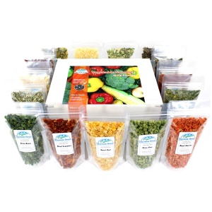 A box containing a variety of vegetables and spices.