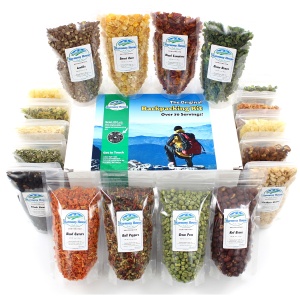 A variety of dried fruits and nuts for emergency food storage on a white background.