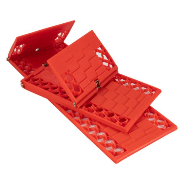A set of red plastic puzzle boxes from Frog & Co. stacked on top of each other.